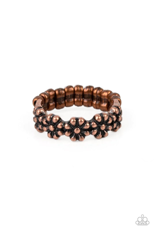 Paparazzi Accessories Farmhouse Fashion - Copper An antiqued collection of copper studs delicately coalesce into a dainty band of daisies across the finger, creating a rustic centerpiece. Features a dainty stretchy band for a flexible fit. Sold as one ind