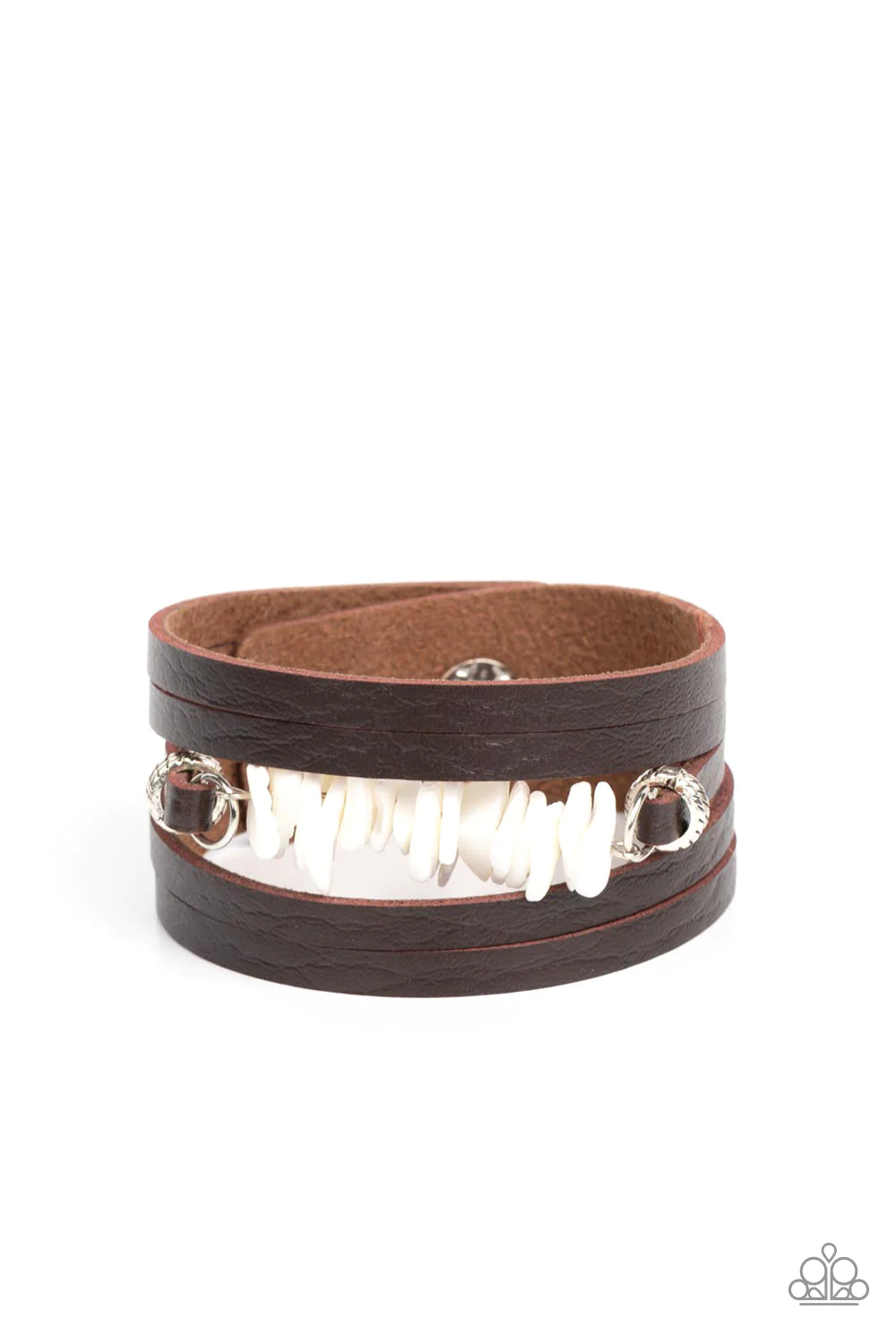 Paparazzi Accessories Tropical Trek - White A brown leather band is spliced into rugged layers around the wrist. Infused with textured silver rings, the centermost strand is infused with a stack of white shell-like accents for a tropical inspired finish.