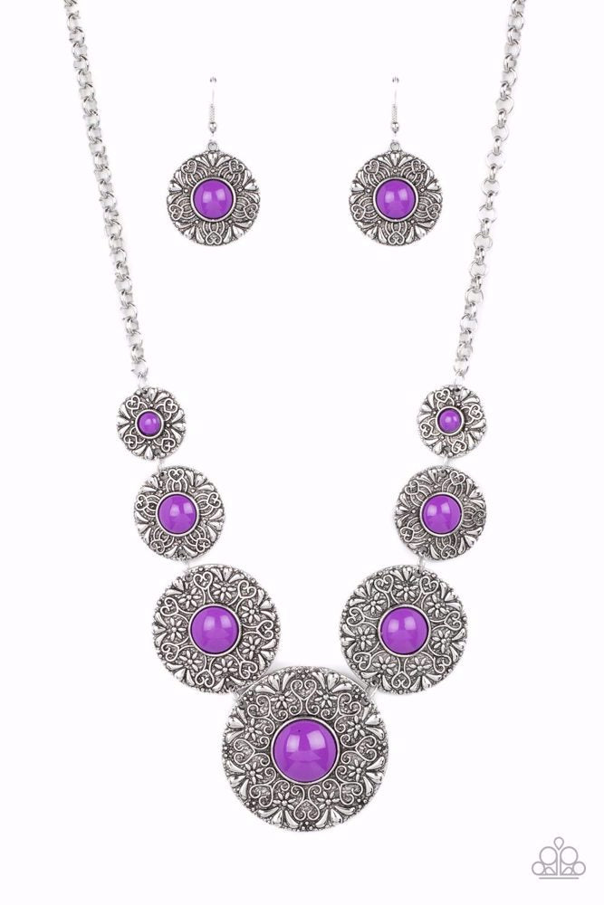 Paparazzi Accessories Garden Glade - Purple Dotted with Dahlia beaded centers, floral embossed silver discs gradually increase in size as they link below the collar for a flowery pop of color. Features an adjustable clasp closure. Sold as one individual n