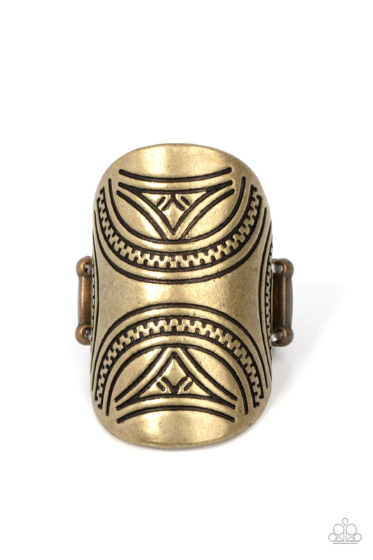 Paparazzi Accessories Pharaoh Party - Brass Stamped in triangular tribal inspired motifs, a brass oval frame curls around the finger for a rustic flair. Features a stretchy band for a flexible fit. Sold as one individual ring. Jewelry