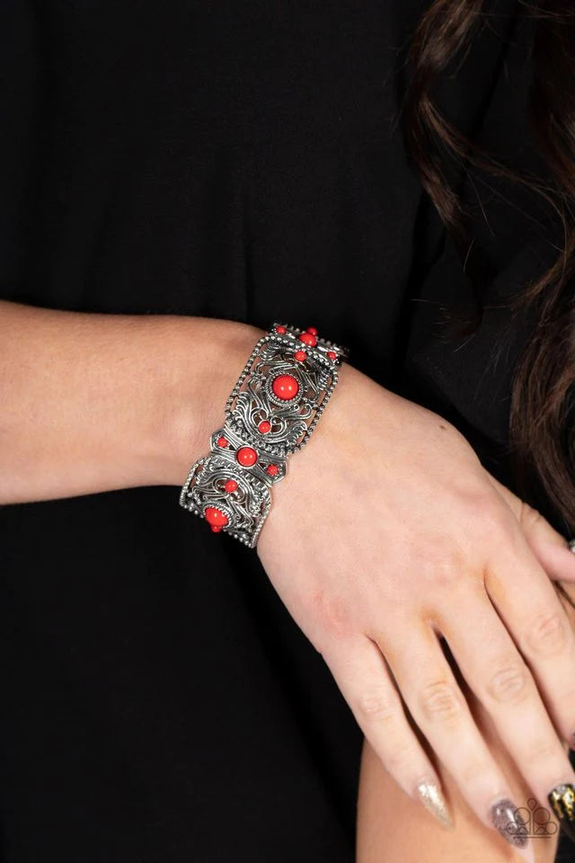 Paparazzi Accessories Going, Going, GONDOLA - Red A bubbly collection of red beads are sprinkled across mismatched silver frames whirling with vine-like filigree. The colorful frames are threaded along stretchy bands around the wrist, creating an enchanti