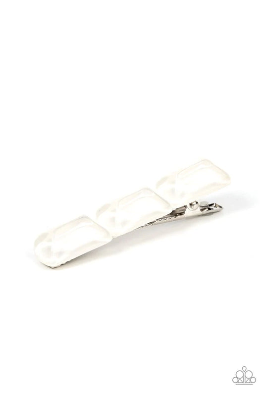 Paparazzi Accessories Gemstone Glimmer - White Enhanced with veins of light, a faceted collection of white faux gemstone beads embellishes the front of a classic silver frame for a tranquil fashion. Features a standard hair clip on the back. Hair Accessor