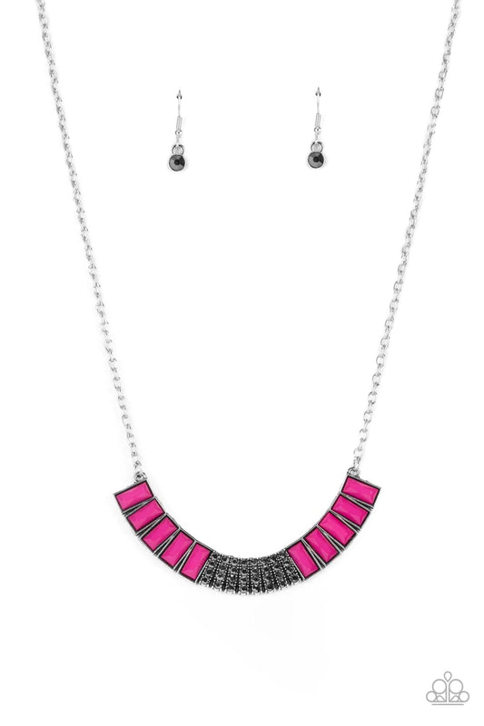 Paparazzi Accessories Coup de MANE - Pink Stacked rows of hematite rhinestones and faceted emerald cut Fuchsia Fedora beads coalesce into a colorful half moon pendant, creating a vivacious pop of color below the collar. Features an adjustable clasp closur