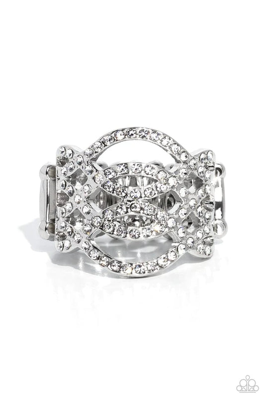 Paparazzi Accessories Interlocked Impression - White A silver frame, lined with white rhinestones, creates the illusion of endless sparkle as each silver band arcs and curls across the finger, allowing the skin to peek through the airy bands for a whimsic