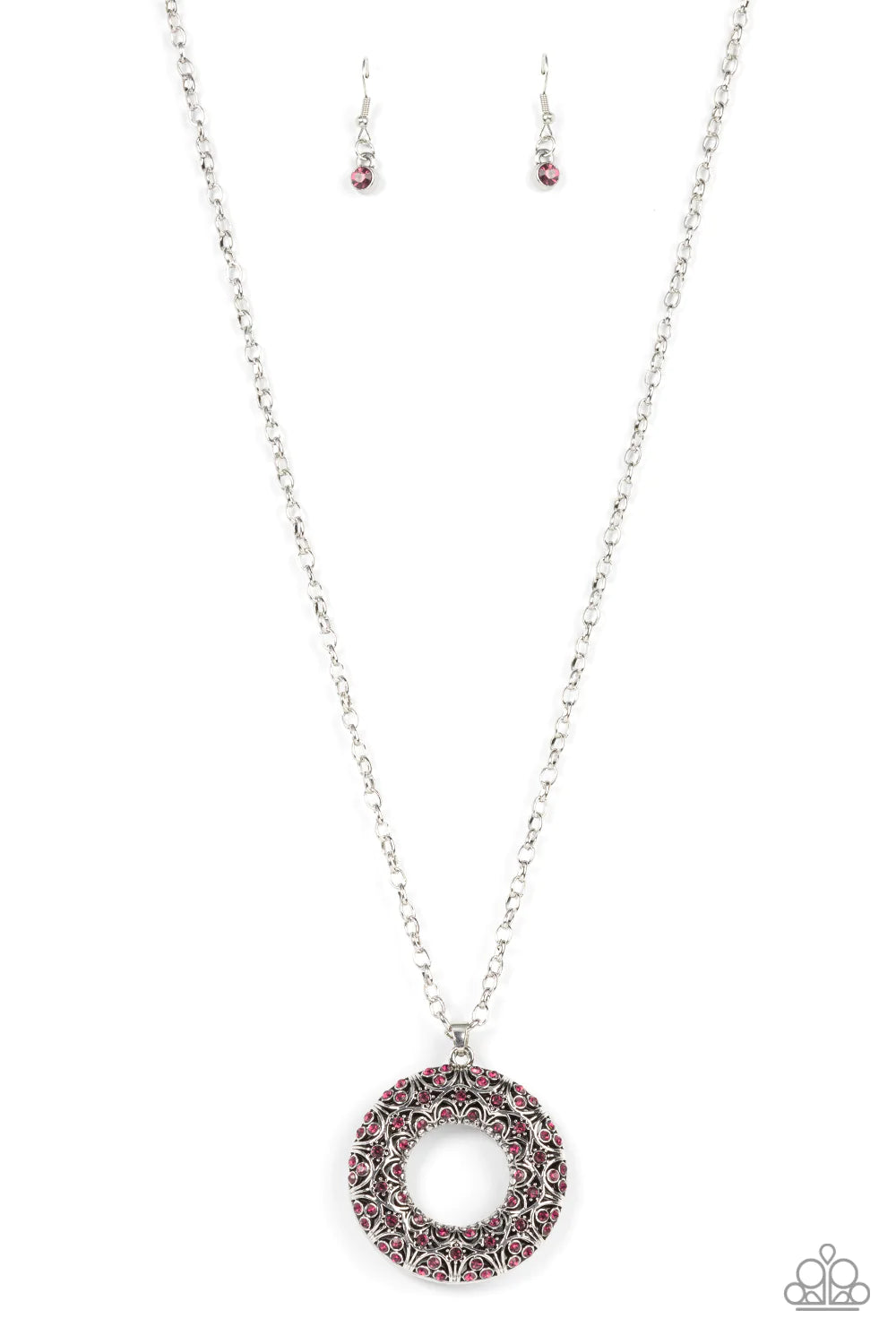 Paparazzi Accessories Wintry Wreath - Pink Dotted with glittering pink rhinestones and filled with frilly silver filigree accents, an oversized silver wreath sparkles from the bottom of an extended silver chain for a whimsical fashion. Features an adjusta