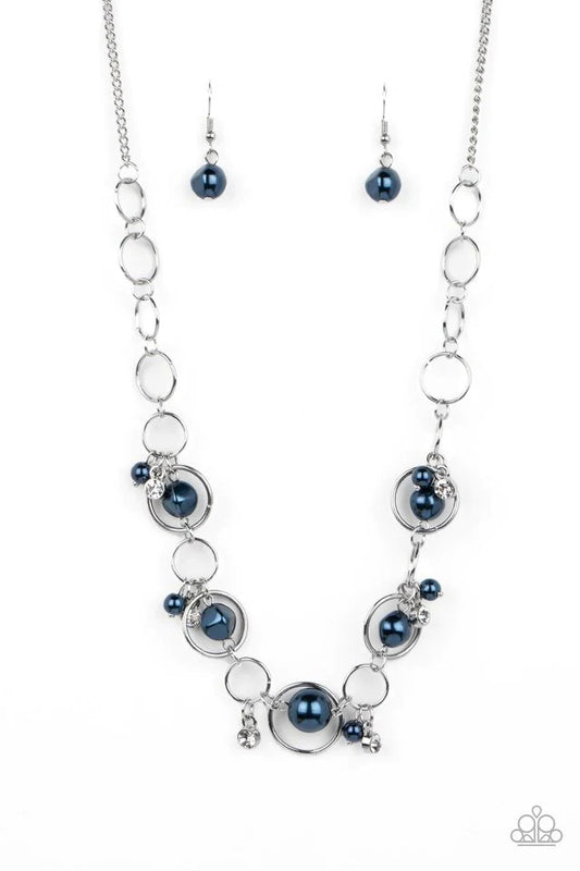 Paparazzi Accessories Think of the POSH-ibilities - Blue Threaded along dainty rods, a bubbly collection of imperfect beads seemingly float inside silver rings as they delicately connect below the collar. Dainty clusters of Montana beads and white rhinest