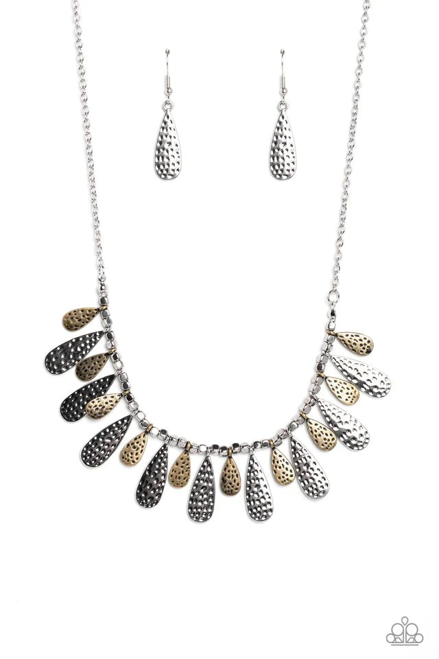Paparazzi Accessories Compelling Confetti - Multi Streaming from a collection of abstract silver studs, brass and silver, metallic teardrops in varying sizes curve up towards the neckline. Featuring a hammered dot motif, the boisterous collection of studs