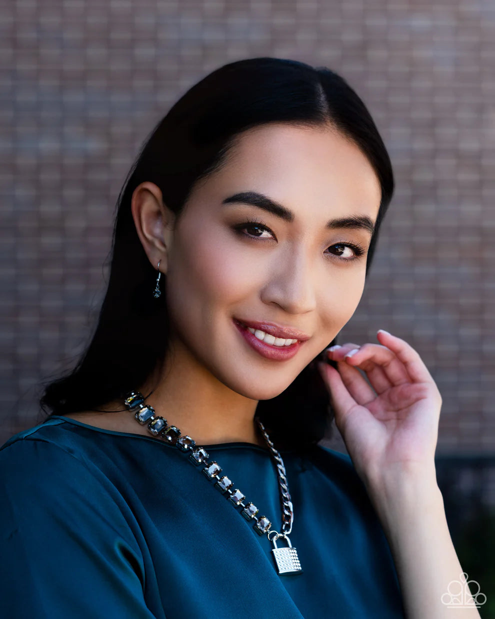 Paparazzi Accessories Lock and Roll - Silver Infused on a classic silver chain, a strand of thick silver curb chain, and a collection of exaggerated, smoky radiant-cut gems in silver pronged fittings combine to create a collision of industrial color aroun