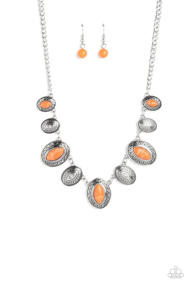 Paparazzi Accessories Textured Trailblazer - Orange Silver oval discs in varying sizes are inscribed with earthy patterns and studs as they coalesce around the collar on a classic silver chain. Pressed into every other disc, a marquise-chiseled orange sto