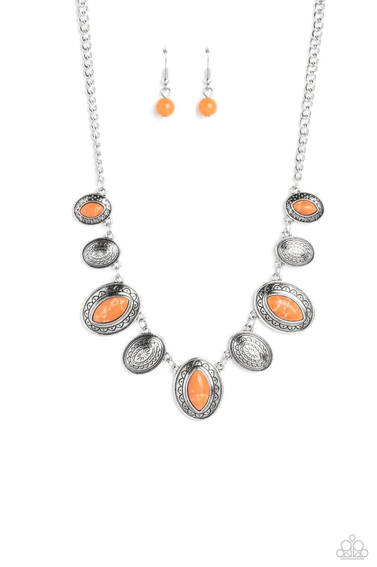 Paparazzi Accessories Textured Trailblazer - Orange Silver oval discs in varying sizes are inscribed with earthy patterns and studs as they coalesce around the collar on a classic silver chain. Pressed into every other disc, a marquise-chiseled orange sto
