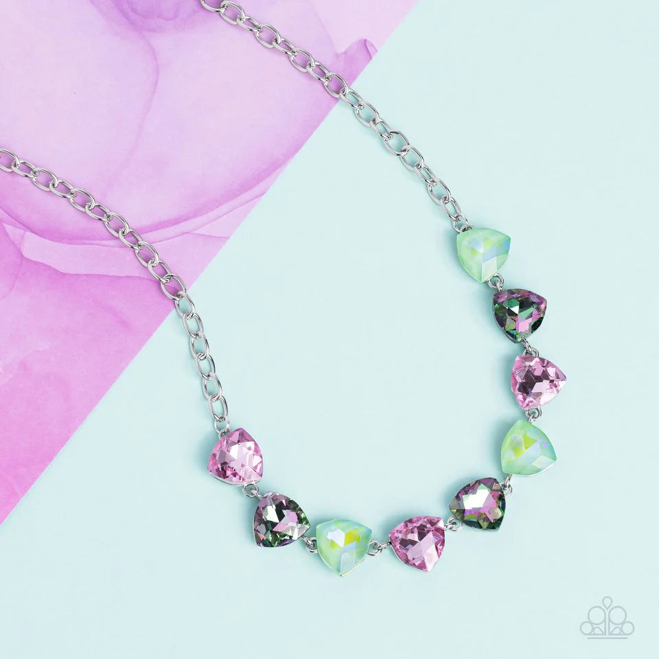 Paparazzi Accessories Dreamy Drama - Green A collection of dreamy trilliant-cut rhinestones in iridescent shades of green and pink fall in line along the collar in a majestic finish. Features an adjustable clasp closure. Due to its prismatic palette, colo
