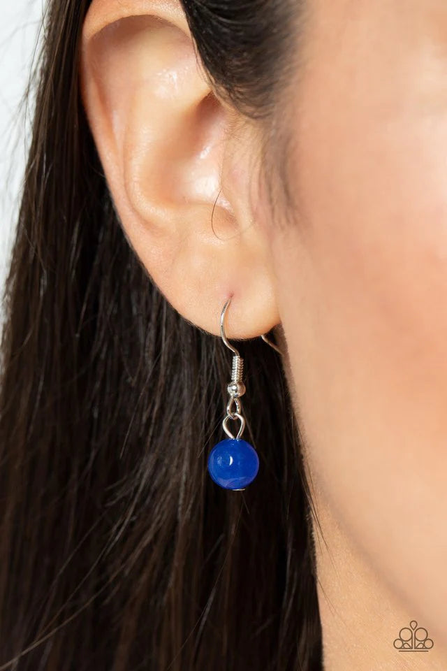 Paparazzi Accessories Right Hand TALISMAN - Blue A rectangular lapis lazuli stone is pressed into the center of a studded silver frame bordered in decorative filigree at the bottom of a rounded silver snake chain, creating a mystical talisman below the co