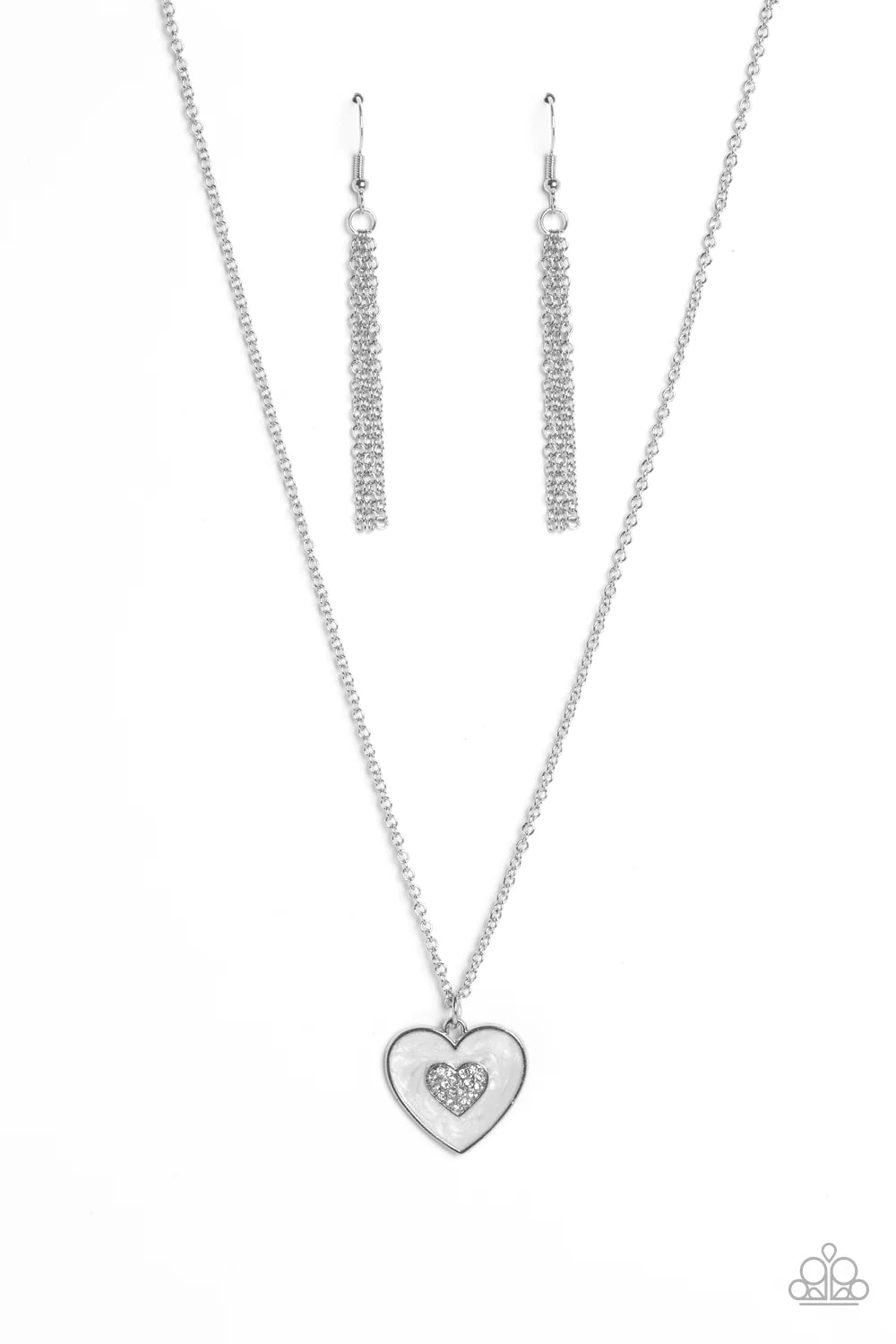 Paparazzi Accessories So This is Love - White Painted in a shimmery white lacquer finish, a silver heart swings from the bottom of a dainty silver chain below the collar for a charming finish. Featured in the center of the white backdrop, a smaller heart,