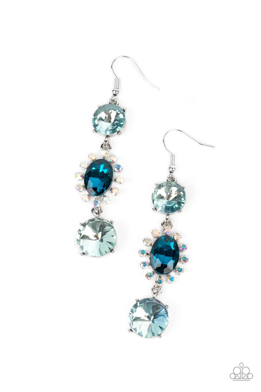 Paparazzi Accessories Magical Melodrama - Blue A trio of colorfully iridescent and brilliantly sparkling blue gems are linked together as they fall glamorously from the ear. A round-cut gem with an exaggerated faceted surface anchors the cascade, followed