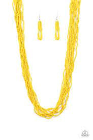 Paparazzi Accessories Congo Colada - Yellow Suspended between two silver fittings, strands of countless yellow seed beads layer across the chest for a vivacious look. Features an adjustable clasp closure. Sold as one individual necklace. Includes one pair