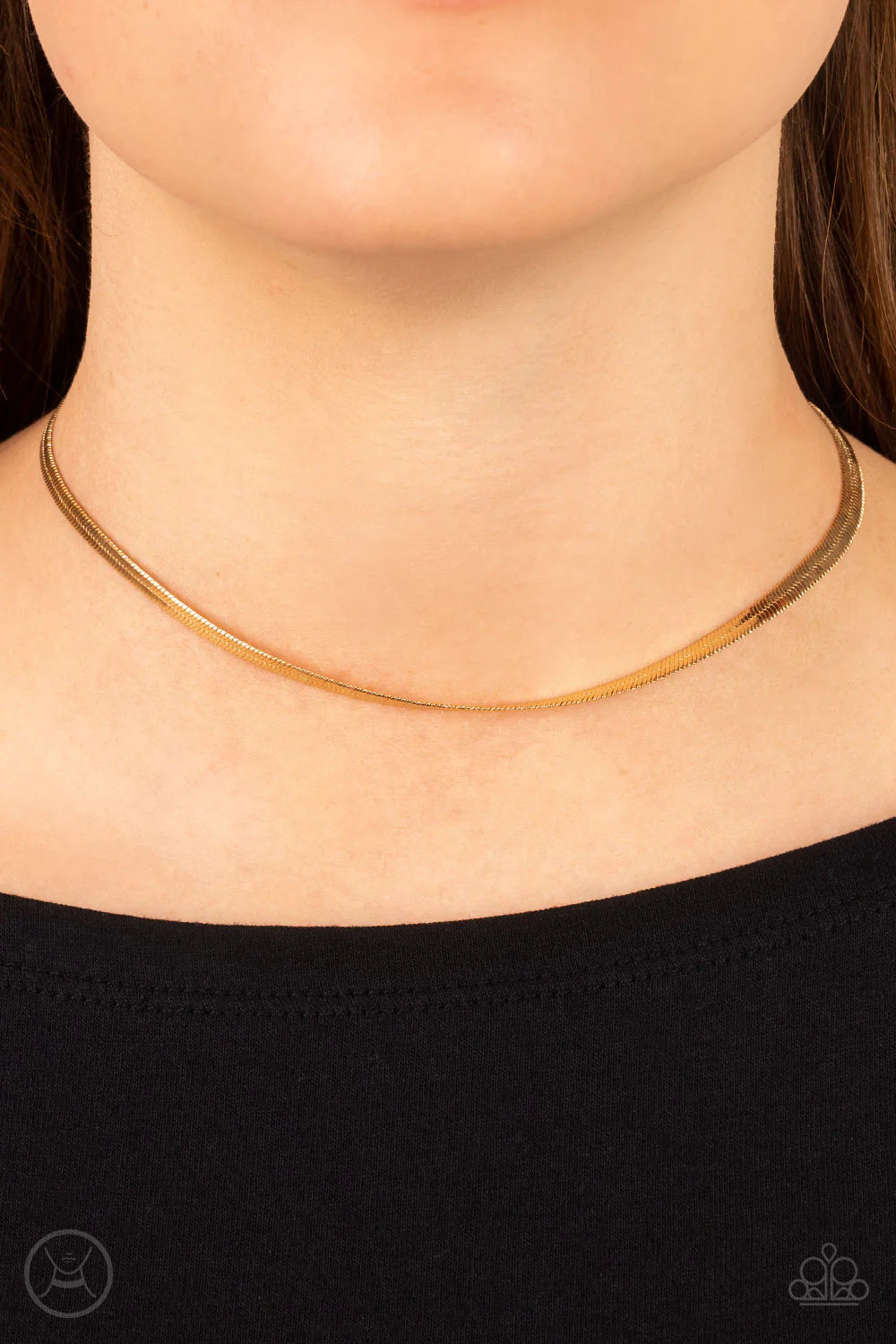 Paparazzi Accessories In No Time Flat - Gold A strand of glistening gold snake chain loops around the neck, resulting in an edgy shimmer. Features an adjustable clasp closure. Sold as one individual choker necklace. Includes one pair of matching earrings.