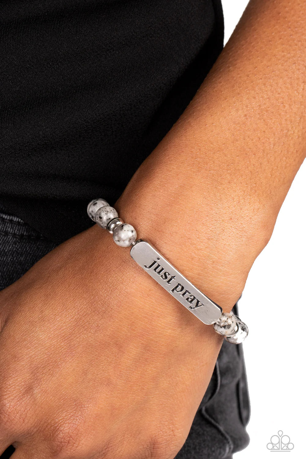 Paparazzi Accessories Just Pray - Silver Smooth, gray speckled stones are stretched across the wrist on an elastic stretchy band, with accents of silver beads sprinkled in. Meeting in the center of the stony display, a curved rectangular bar is stamped wi
