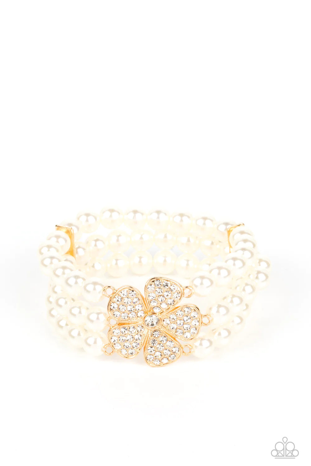 Paparazzi Accessories Park Avenue Orchard - Gold Separated by dainty gold plates, classic white pearls are threaded along three stretchy bands around the wrist. Encrusted in glassy white rhinestones, a glitzy gold flower blooms at the center of the wrist