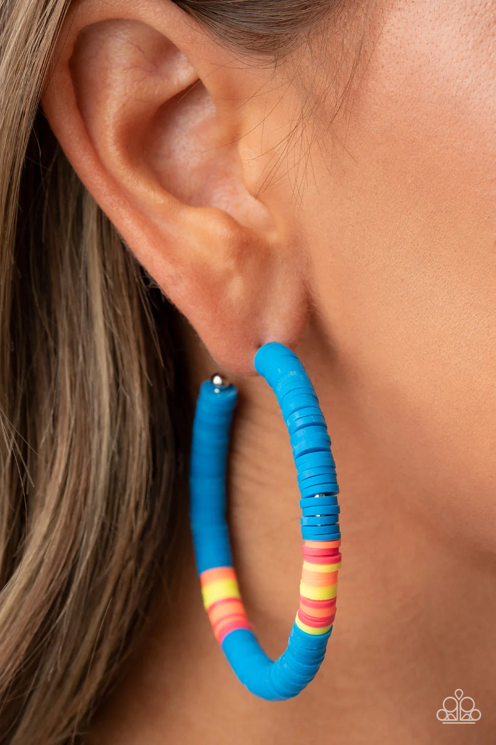 Paparazzi Accessories Colorfully Contagious - Blue Rubbery blue, pink, yellow, and orange bands are threaded along an oversized silver hoop, creating a courageous pop of color. Earring attaches to a standard post fitting. Hoop measures approximately 2 1/4