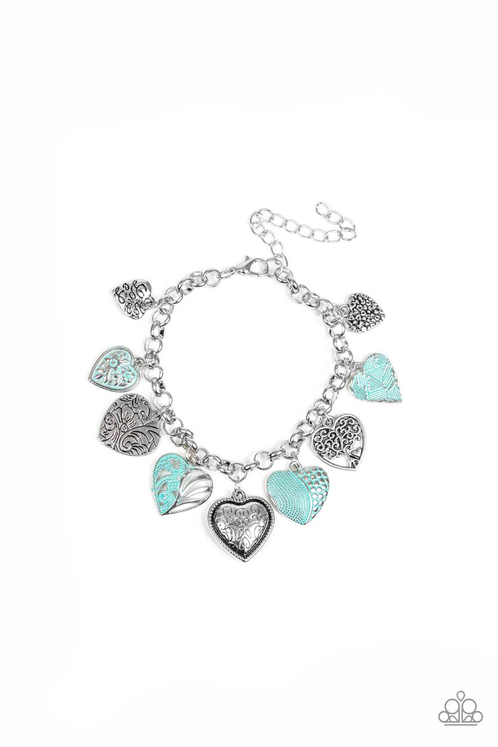 Paparazzi Accessories Garden Hearts - Green Featuring an array of floral patterns, a collection of silver hearts swings from a shimmery silver chain. Alternating charms are brushed in a minty green finish, creating a colorful fringe around the wrist. Feat
