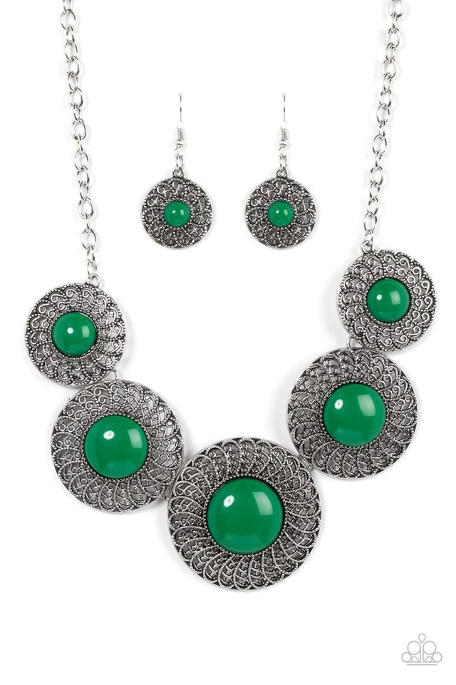 Paparazzi Accessories Detail Orientated - Green Dotted with bubbly Leprechaun beads, silver discs spinning with swirly petal motifs gradually increase in size as they link below the collar for a statement-making floral fashion. Features an adjustable clas