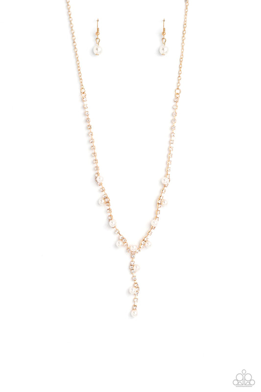 Paparazzi Accessories Upper Class - Gold Attached to a section of dainty gold links, white rhinestones, pressed into shiny gold box chain fittings swing down the neckline in a lariat-like manner for an effulgent glow. Sporadically infused along the box ch
