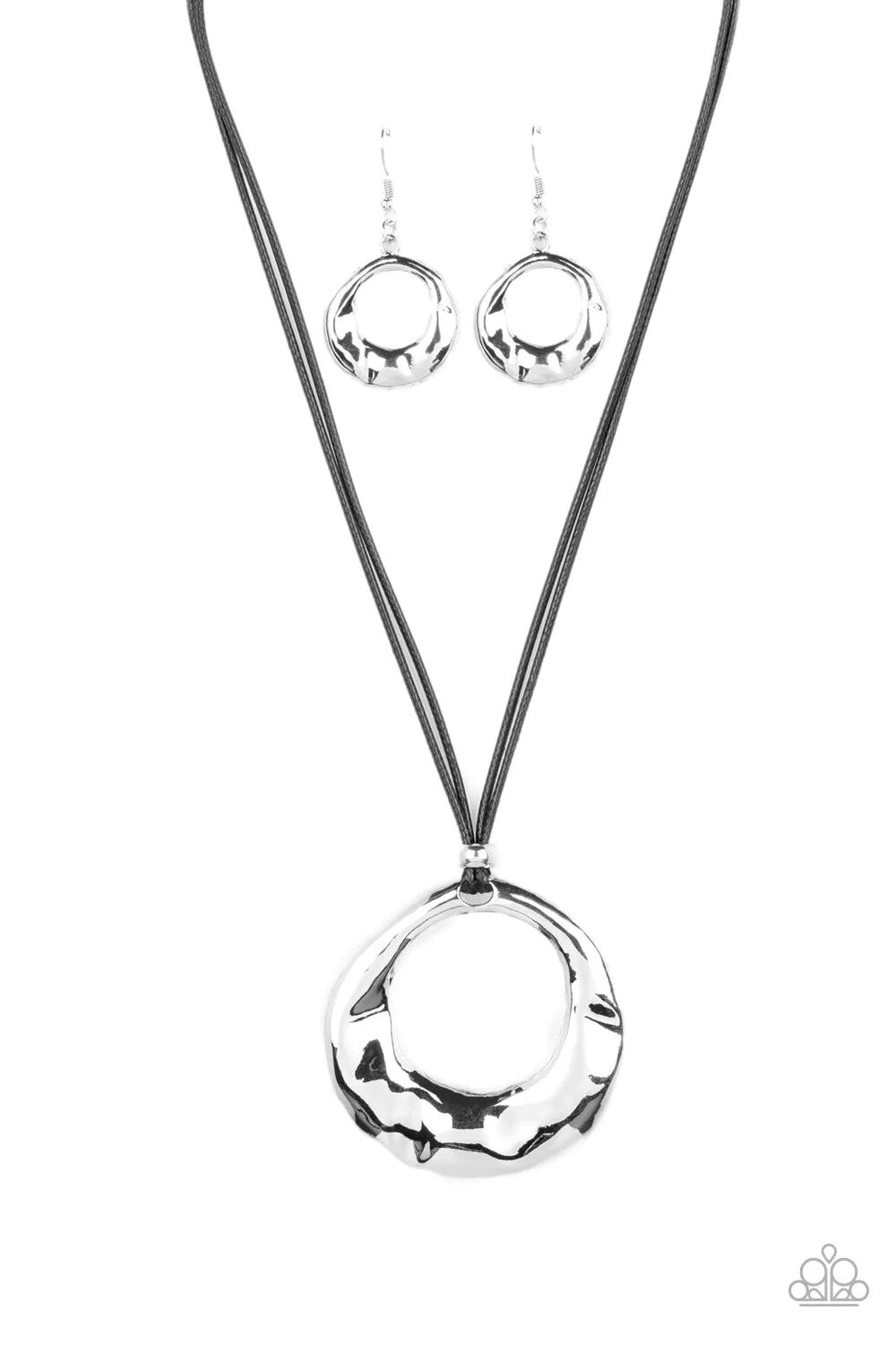 Paparazzi Accessories Tectonic Treasure - Silver An oversized, oblong, silver hoop rippling with hammered textures swings from the bottom of a collection of black cording. A single silver bead glides down the bottom of the cording for a dramatic industria