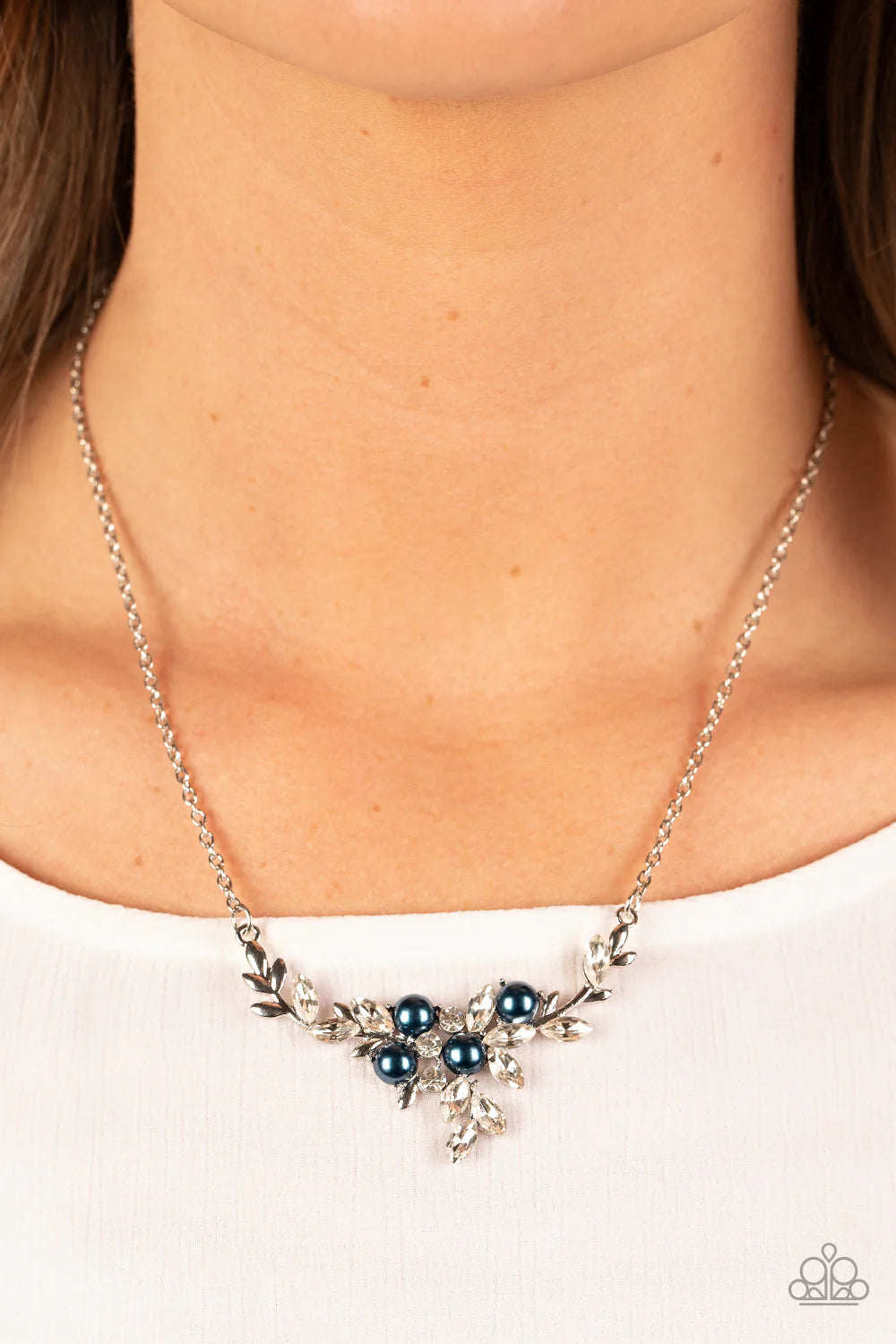 Paparazzi Accessories Because I’m The Bride - Blue Clusters of bubbly blue pearls and glassy white rhinestones delicately adorn dainty silver branches below the collar, resulting in a leafy elegance below the collar. Features an adjustable clasp closure.