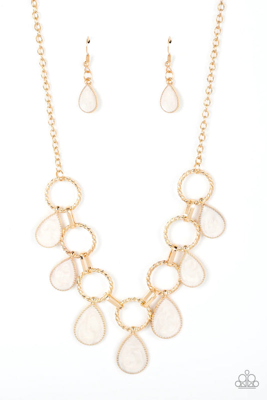 Paparazzi Accessories Golden Glimmer - Gold Swirling with white glazed finishes, textured gold teardrops swing from the bottoms of spun gold hoops that link with pinched gold fittings below the collar, resulting in a refined fringe below the collar. Featu