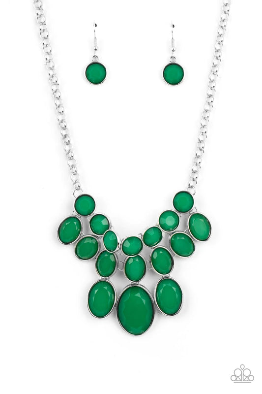 Paparazzi Accessories Delectable Daydream - Green A decadent collection of faceted leprechaun beads gradually increase in size as they fall into a tapered display. The smallest round beads anchor the design, with the rows underneath them slowly elongating