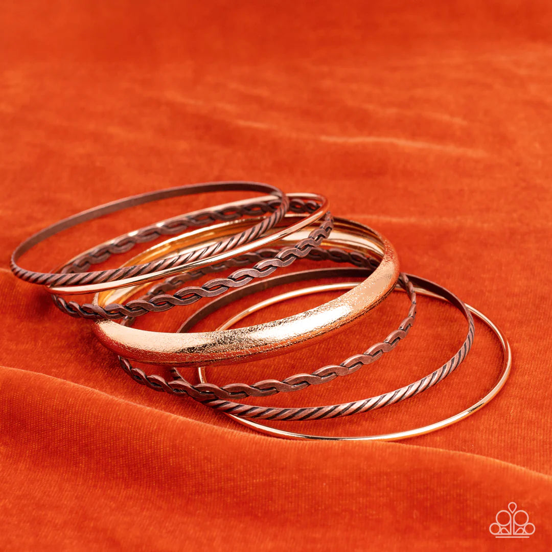 Paparazzi Accessories Trophy Texture - Multi Brushed in an antiqued finish, a mismatched collection of braided and hammered copper bangles join with shiny and textured gold bangles as they stack across the wrist for a classic mixed metallic look. Sold as