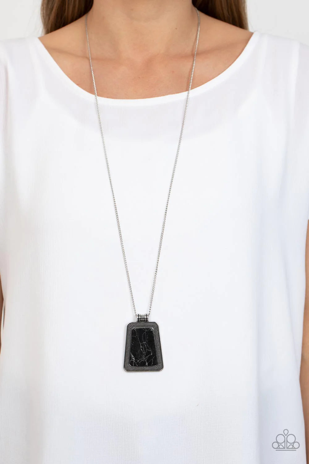 Paparazzi Accessories Private Plateau - Black A flat and trapezoidal black stone is pressed into the center of a studded silver frame, resulting in a rustic pendant at the bottom of a lengthened silver chain. Features an adjustable clasp closure. Sold as