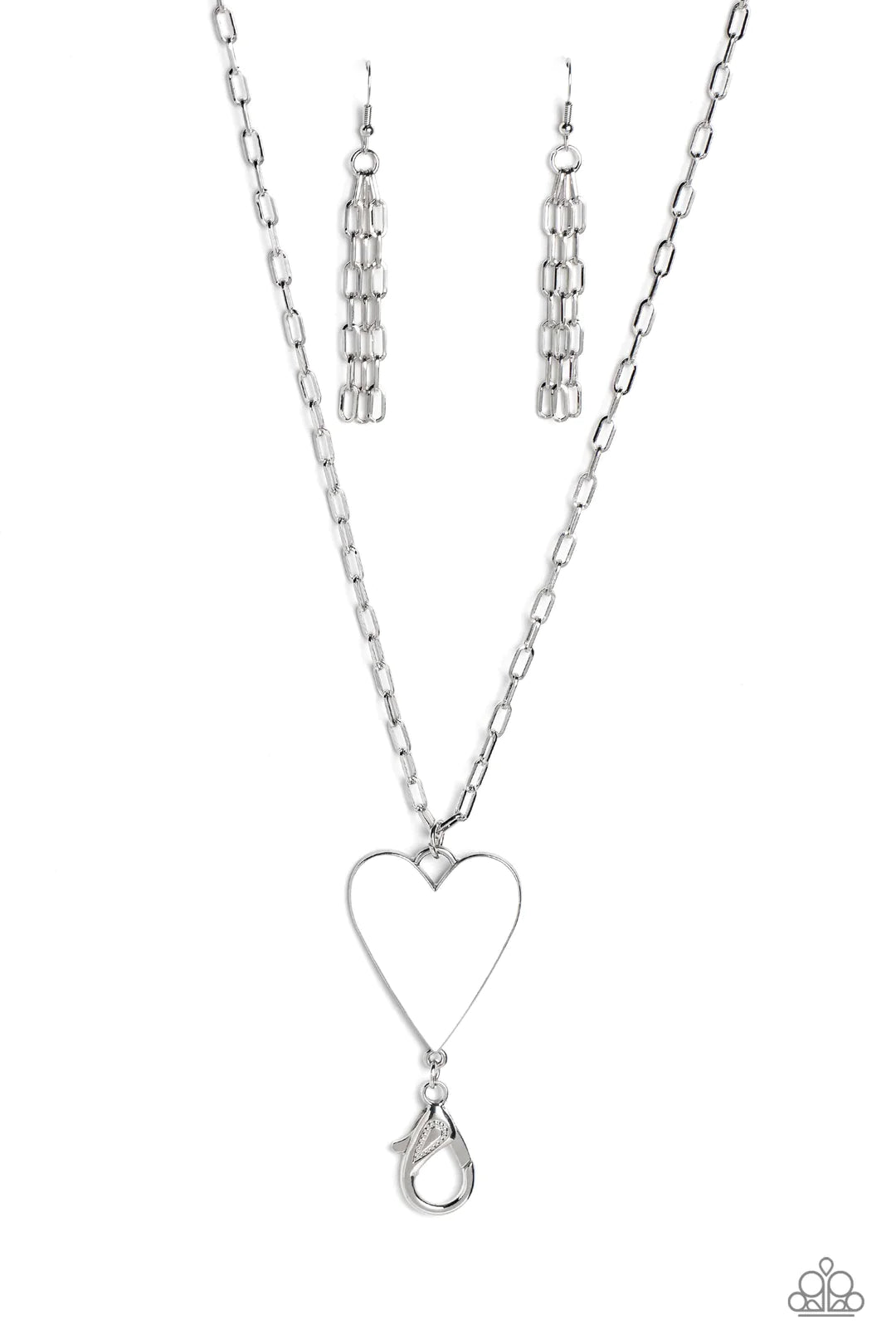 Paparazzi Accessories Subtle Soulmate - White Shiny silver oval links coalesce down the neck on an elongated chain, meeting a white heart pendant wrapped in an understated silver frame for a colorfully romantic finish. A lobster clasp hangs from the botto