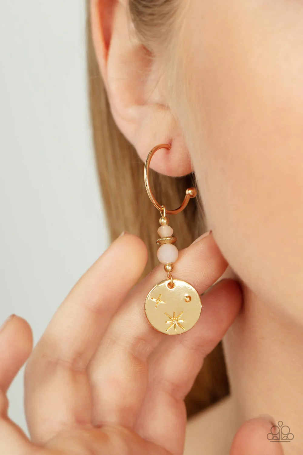 Paparazzi Accessories Artificial STARLIGHT - Gold Hanging from shiny gold hoops, a pair of opaque faceted beads brushed in a subtle reflective coating stack together with tiny gold beads. The beads sparkle down to a shiny gold pendant stamped with minimal