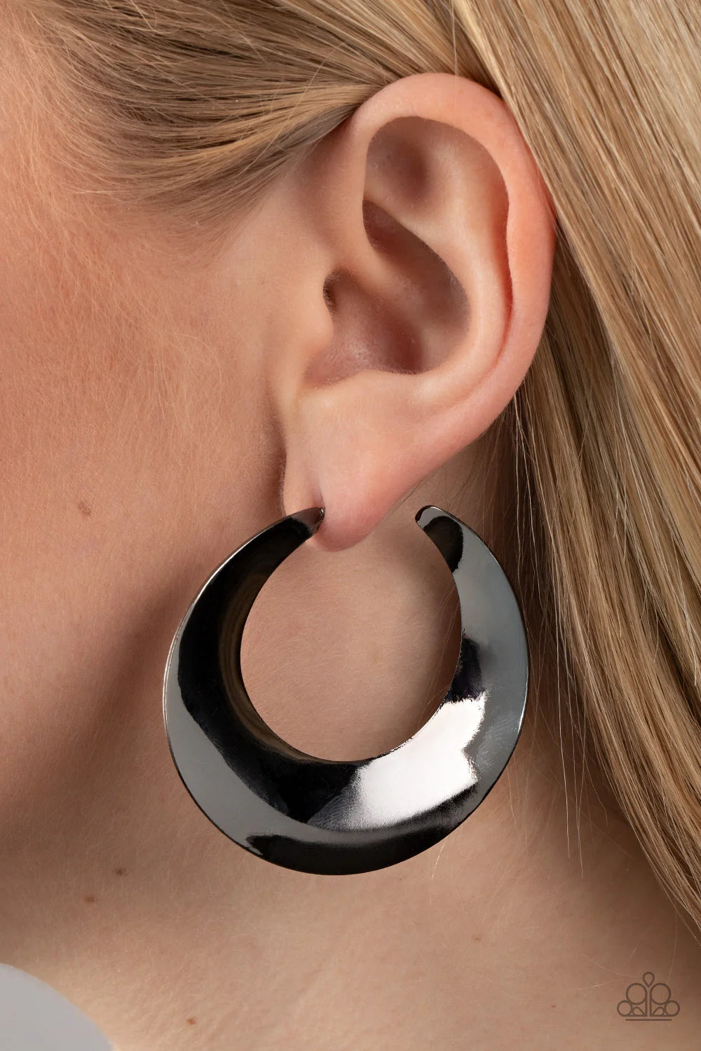 Paparazzi Accessories Power Curves - Black A flat gunmetal hoop widens and bevels at the center, curving into a dramatic shimmer. Earring attaches to a standard post fitting. Hoop measures approximately 2" in diameter. Sold as one pair of hoop earrings. J
