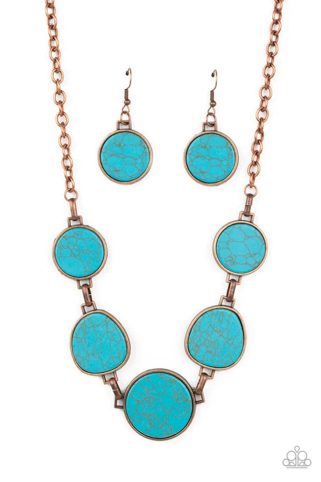 Paparazzi Accessories Santa Fe Flats - Copper Flat turquoise stones are pressed into antiqued copper frames, creating a bold, rustic statement piece. The irregular shape of the stones brings an artisanal touch to the design, as the hinge-like links connec