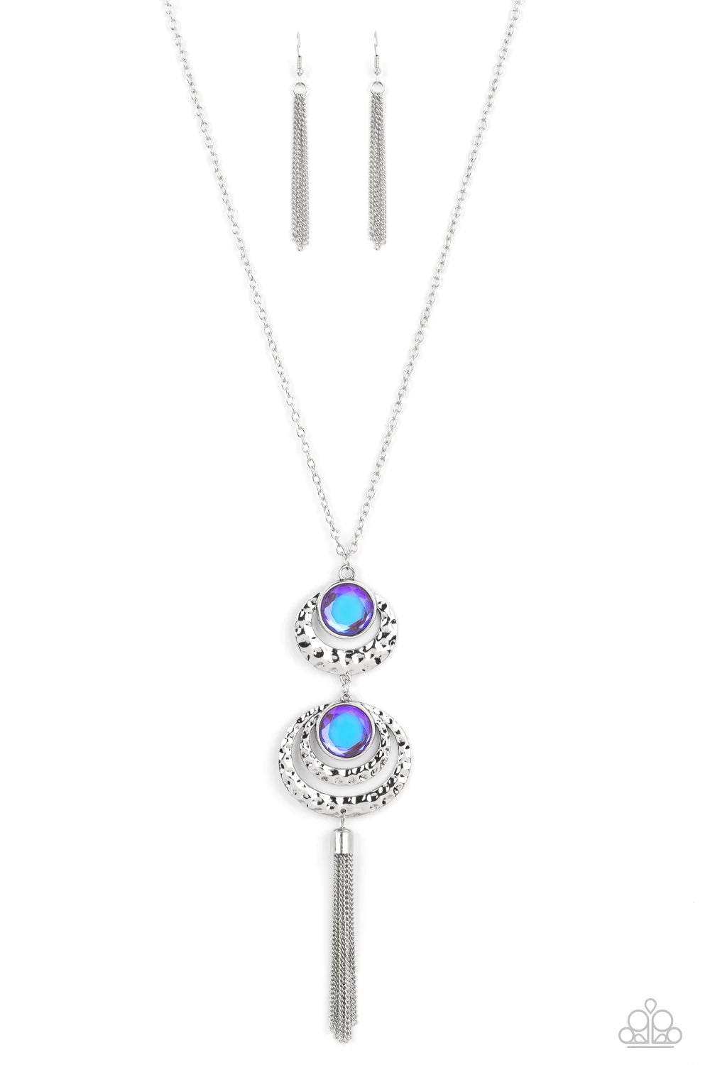 Paparazzi Accessories Limitless Luster - Purple Hammered silver bars arc out from under a pair of prismatic purple gems at the bottom of a lengthened silver chain. A shimmery silver chain tassel swings from the bottom of the enchanted frames, adding playf