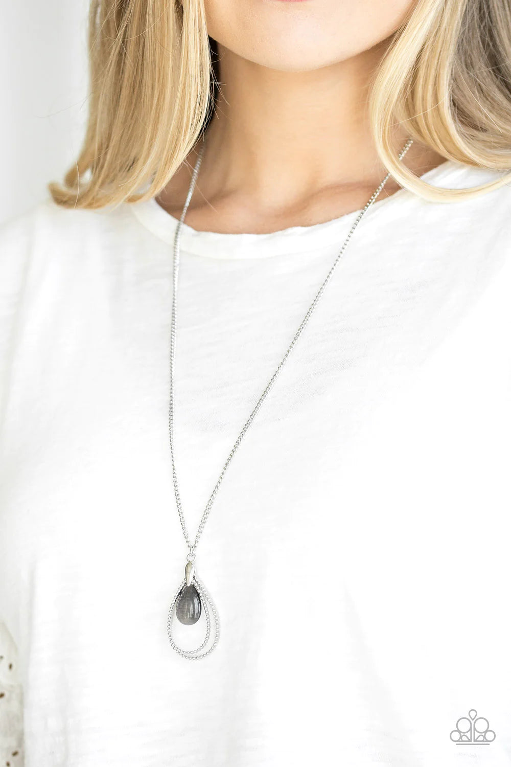 Paparazzi Accessories Teardrop Tranquility - Black Studded silver teardrops swing from the bottom of a shimmery silver chain. A glowing black moonstone attaches to the innermost frame, creating a whimsical pendant. Features an adjustable clasp closure. So