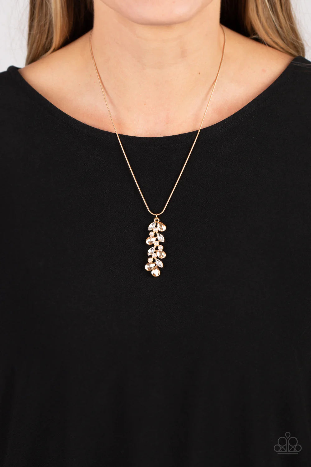 Paparazzi Accessories Pearls Before VINE - Gold Dainty faceted gold colored teardrops- and white marquise-cut gems climb around clusters of dainty white half-pearls, creating an elongated pendant that slides elegantly along a skinny gold snake chain. Feat