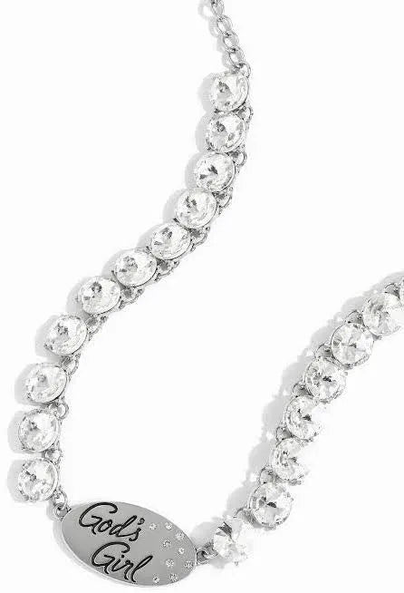 Paparazzi Accessories Gods Girl - White ! A flashy collection of oversized white gems wraps along the neckline, leading to a polished silver plate in the center. The phrase “God’s Girl” is inscribed on the metallic centerpiece in a decorative font, as a d