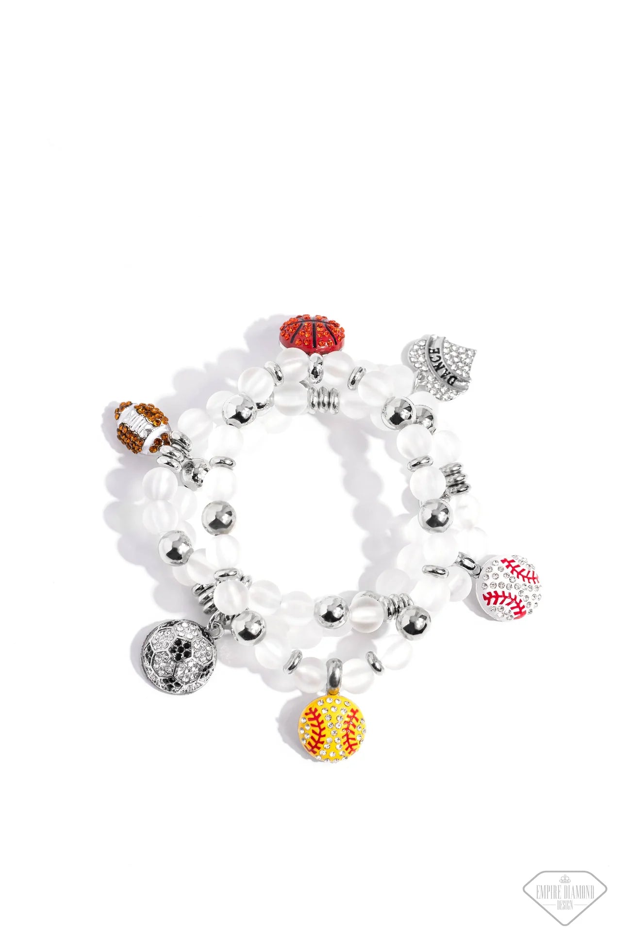 Paparazzi Accessories Sports Fan - Multi A mismatched assortment of various rhinestone-encrusted sports balls and a "DANCE"-stamped rhinestone heart, silver accents, and white glass-like beads are threaded along stretchy bands around the wrist, creating a
