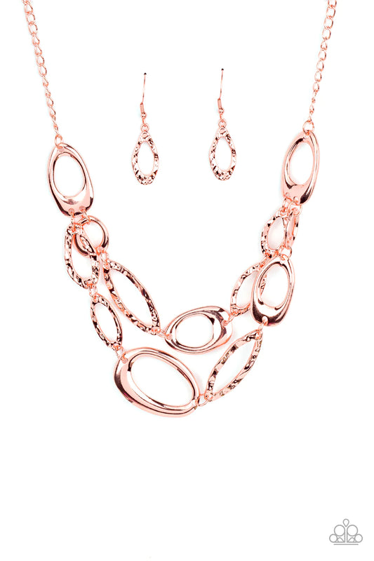Paparazzi Accessories Game Oval - Copper A mismatched assortment of asymmetrical and hammered shiny copper ovals delicately links below the collar, creating refined metallic layers. Features an adjustable clasp closure. Sold as one individual necklace. In