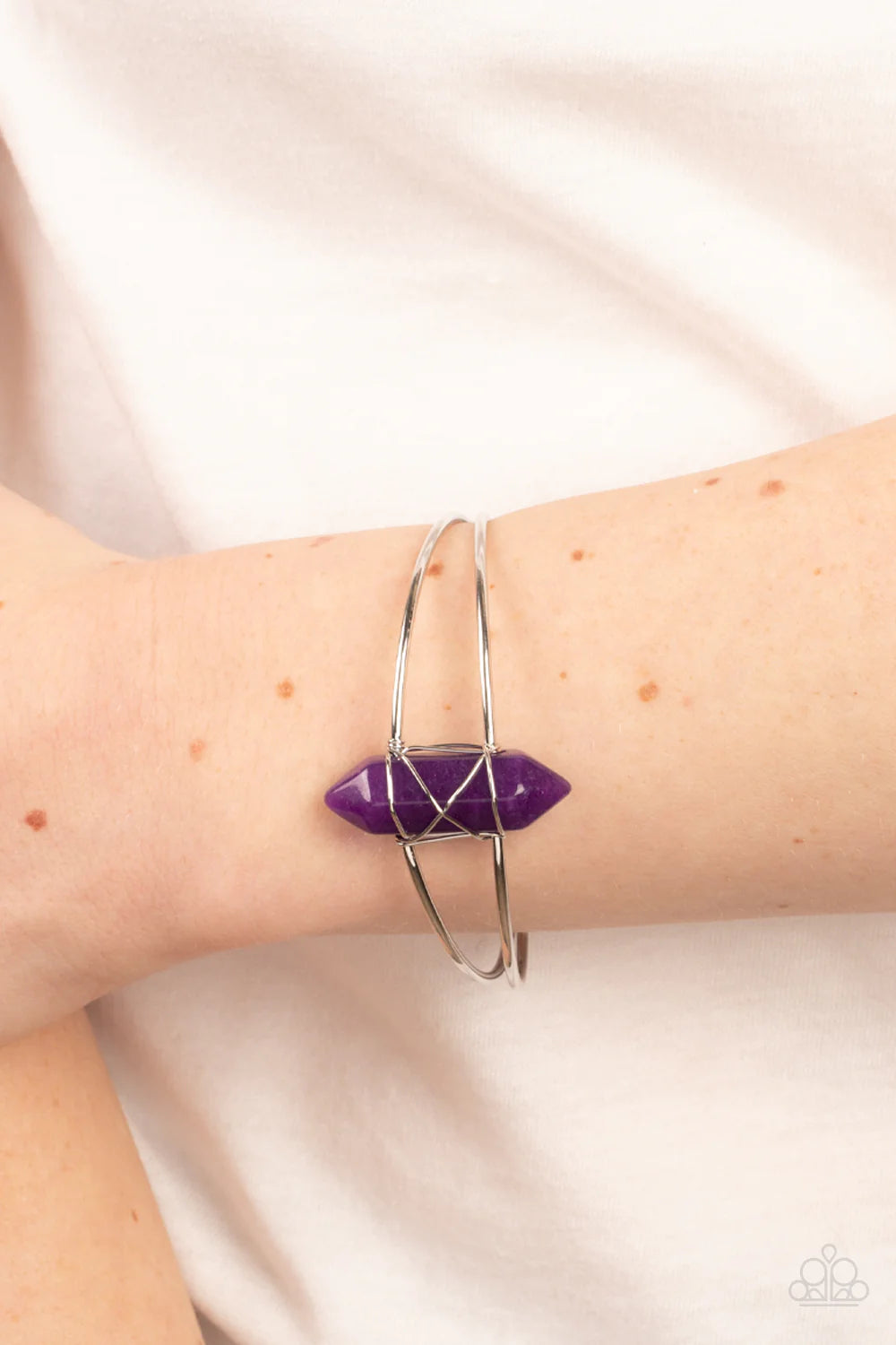 Paparazzi Accessories Terra Transcendence - Purple A serene amethyst stone pendulum is wire wrapped in place at the center of an airy silver cuff, resulting in a tranquil centerpiece. Sold as one individual bracelet. Jewelry