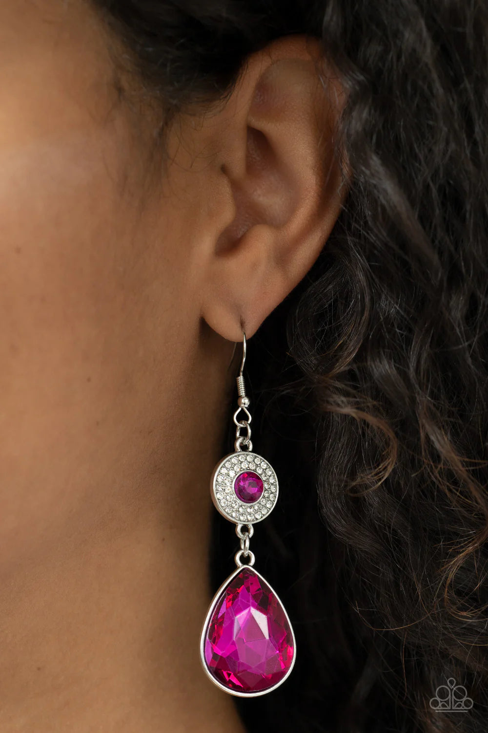 Paparazzi Accessories Collecting My Royalties - Pink Dotted with a solitaire Fuchsia Fedora rhinestone, a white rhinestone encrusted silver disc gives way to an oversized teardrop Fuchsia Fedora gem, resulting in a glamorous lure. Earring attaches to a st