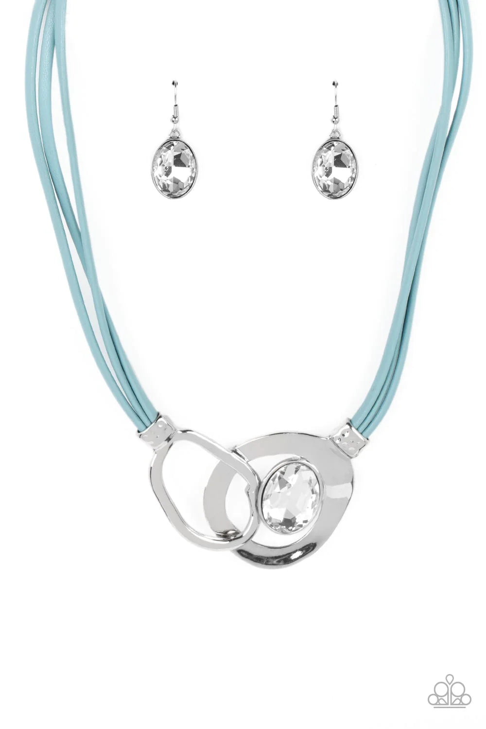 Paparazzi Accessories Californian Cowgirl - Blue Attached to shimmery strands of blue leather, a pair of oversized and warped silver links delicately overlaps into a contemporary centerpiece below the collar. An exaggerated white gem asymmetrically embell