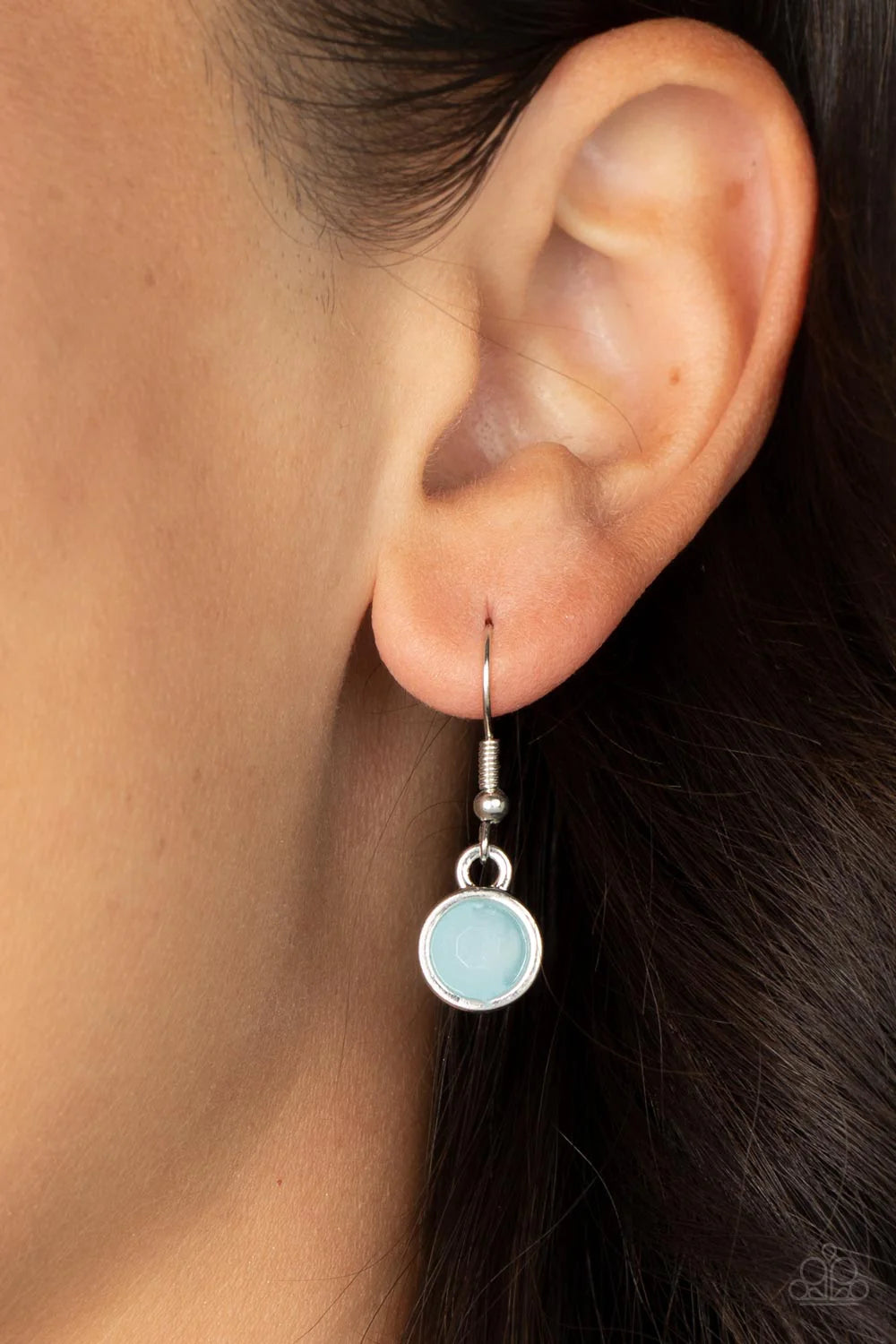 Paparazzi Accessories Moonbeam Magic - Blue Featuring a milky shimmer, opaque Spun Sugar crystal-like beads are pressed into simple silver settings as they dance below the collar for a colorfully carefree look. Features an adjustable clasp closure. Sold a