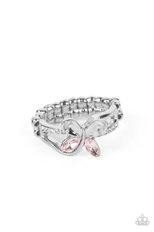 Paparazzi Accessories Fetching Flutter - Pink A silver butterfly, with dainty, marquise-cut, pink rhinestone hind-wings, flutters atop a layered silver cuff for an enchanting fashion. The butterfly is anchored to the ring with bars of dainty curved silver
