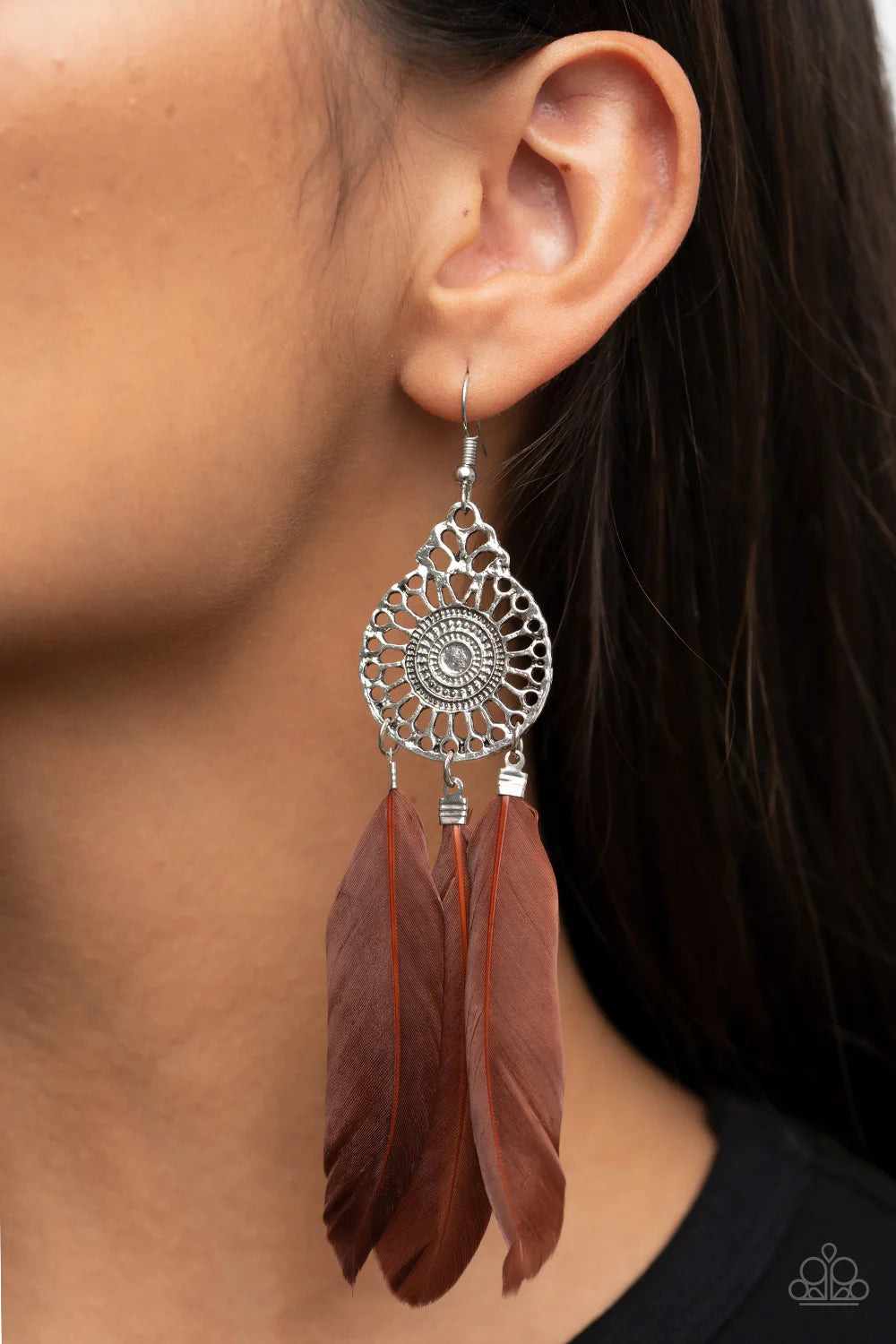 Paparazzi Accessories Pretty in Plumes - Brown Three brown feathers swing from the bottom of a dizzying silver frame featuring airy filigree detail, resulting in a flirtatiously colorful fringe. Earring attaches to a standard fishhook fitting. Sold as one