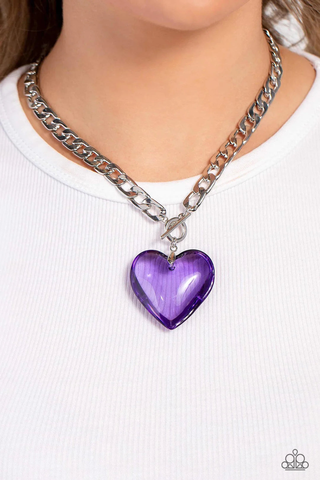 Paparazzi Accessories GLASSY-Hero - Purple Featuring a glossy finish, an oversized, rich, purple heart pendant swings from the bottom of a thick silver curb chain below the collar for a romantic declaration. Features a toggle closure. Sold as one individu