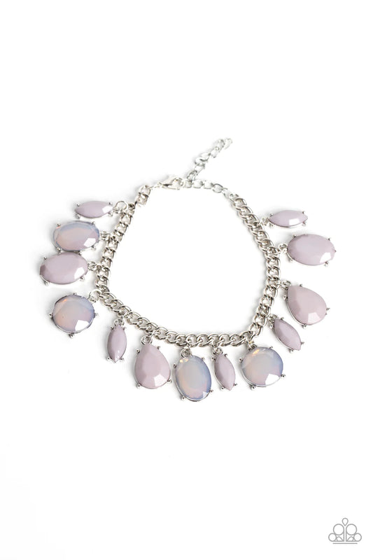 Paparazzi Accessories Serendipitous Shimmer - Silver A charming collection of opaque and translucent Gray Lilac beads swings from a classic silver chain. The faceted beads are a mishmash of shapes and sizes, creating a flirtatious pop of color around the